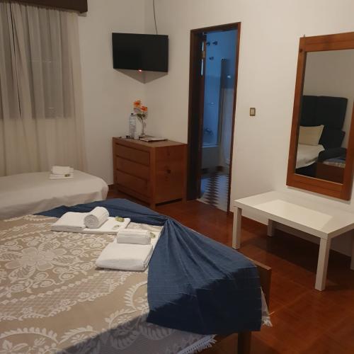 quarto_triplo_com_vista_de_montanha3